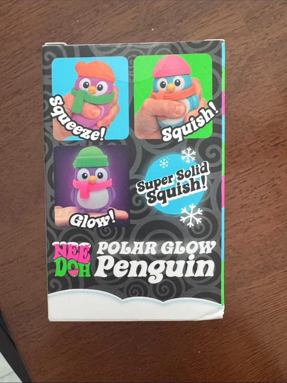 Needoh squishy Polar Glow Penguin - Pink with Orange Hat and Green Scarf